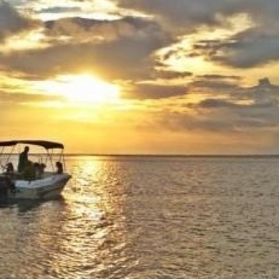 a sunset over a body of water