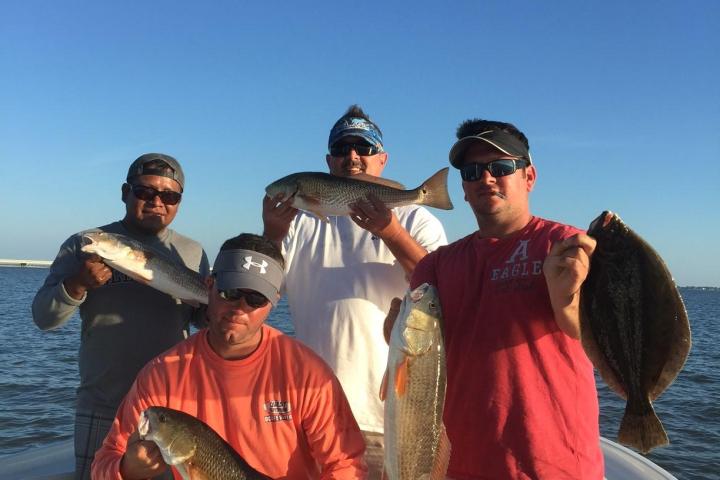 a man holding a fish
