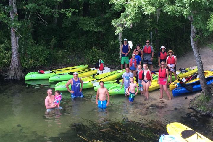 a group of people on a raft
