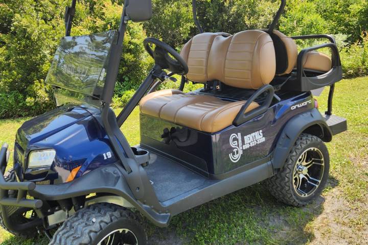 a car parked in the grass