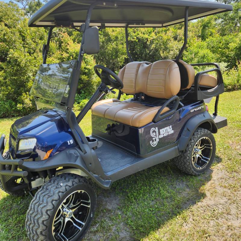 a car parked in the grass