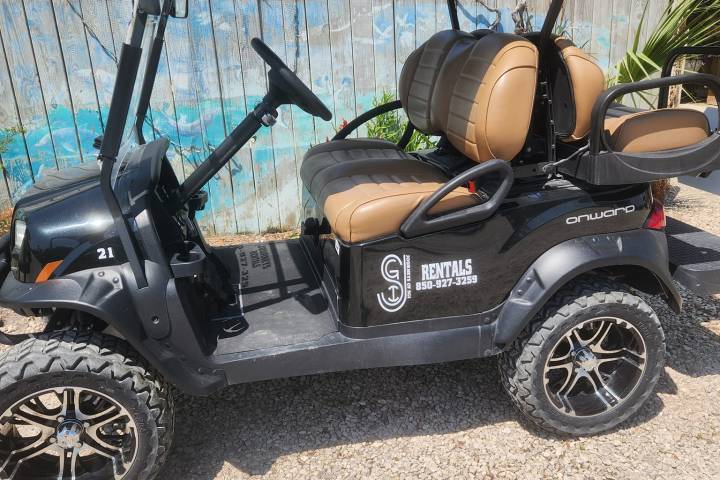 a motorcycle parked in front of a car