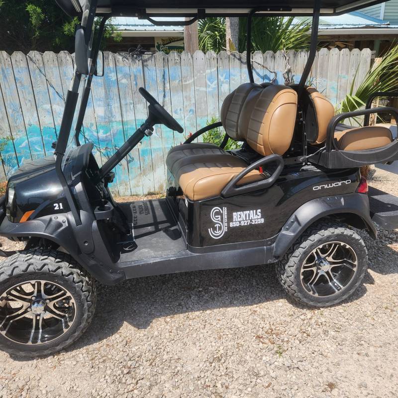 a motorcycle parked in front of a car
