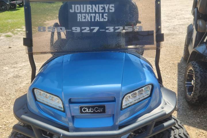 a car parked in the dirt