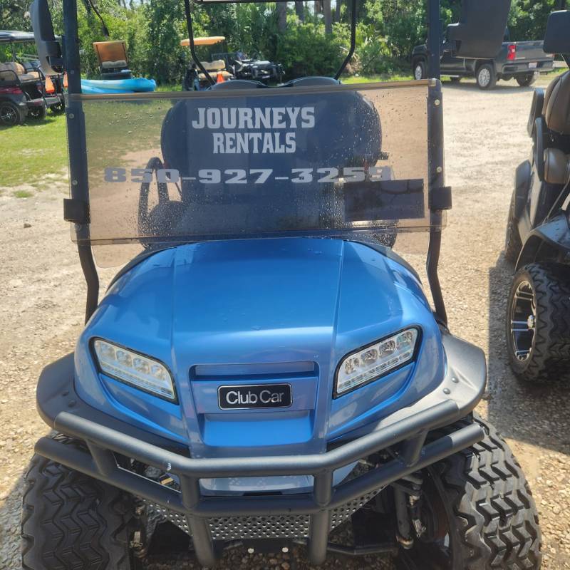 a car parked in the dirt