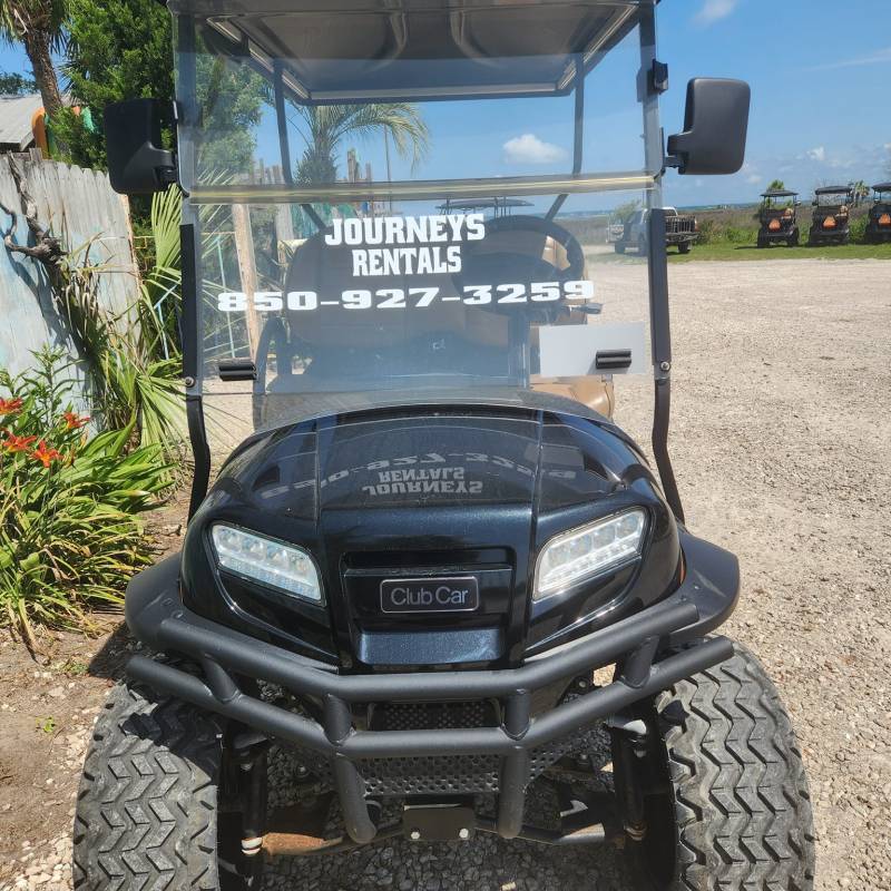 a car parked on a dirt road