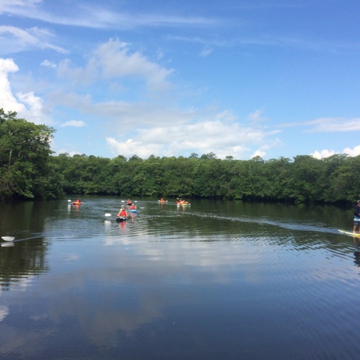 a small boat in a body of water
