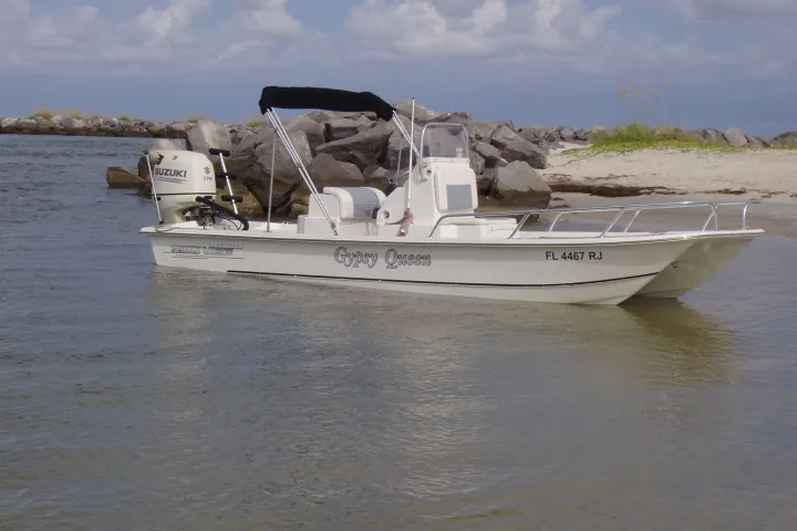 a small boat in a body of water
