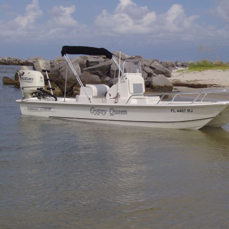 a small boat in a body of water