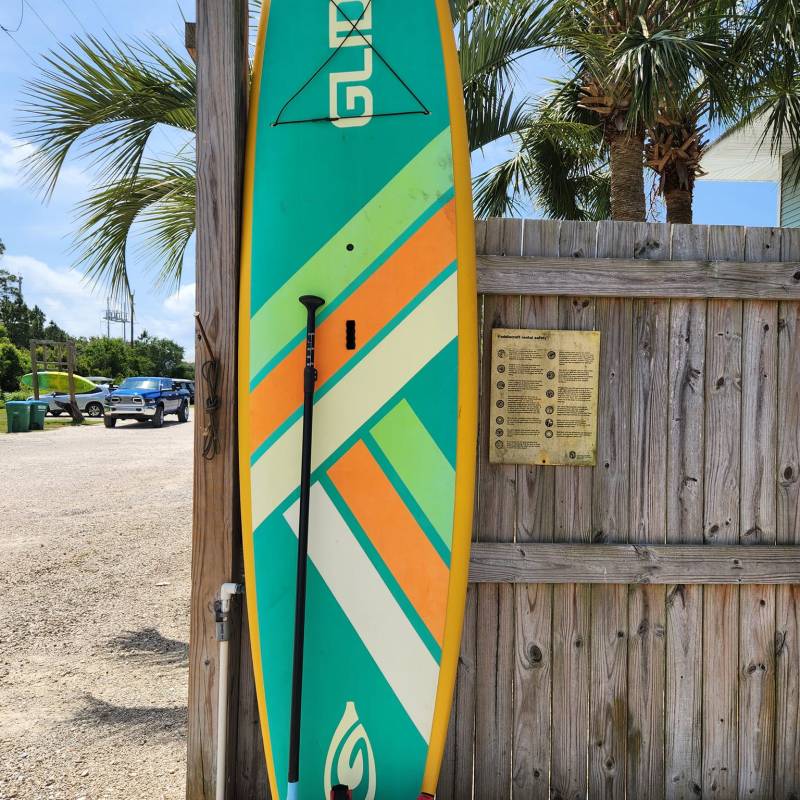 a sign on the side of a fence